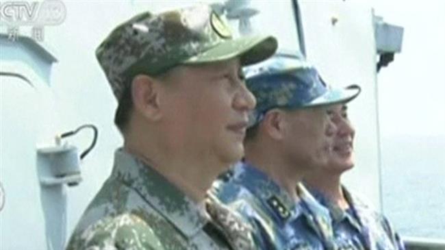 China’s Xi attends huge naval drill in South China Sea