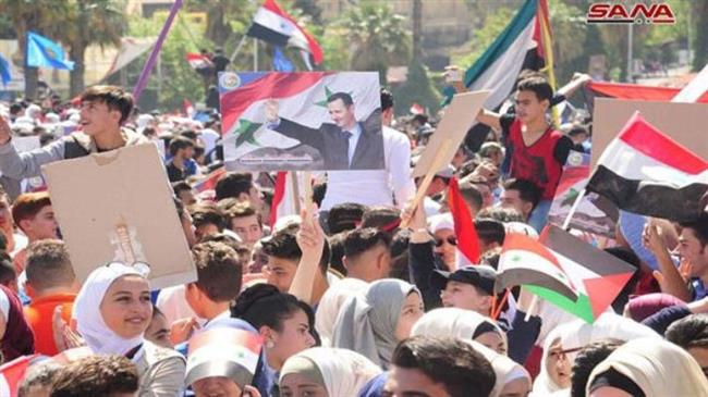 Syrians rally in Damascus to support Assad, slam US strikes