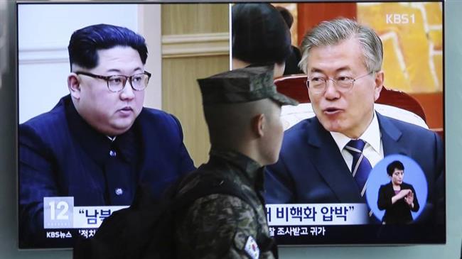 Two Koreas open hotline between their leaders  