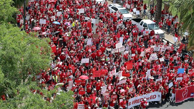 US teachers rally for second day over pay, funding