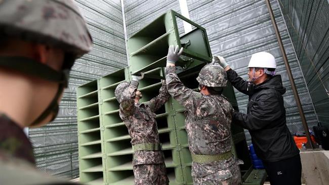 Two Koreas dismantle propaganda loudspeakers