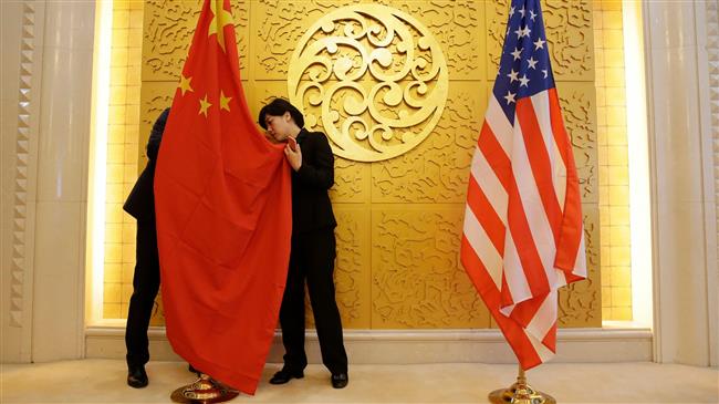 China, US officials meet to avert looming trade war