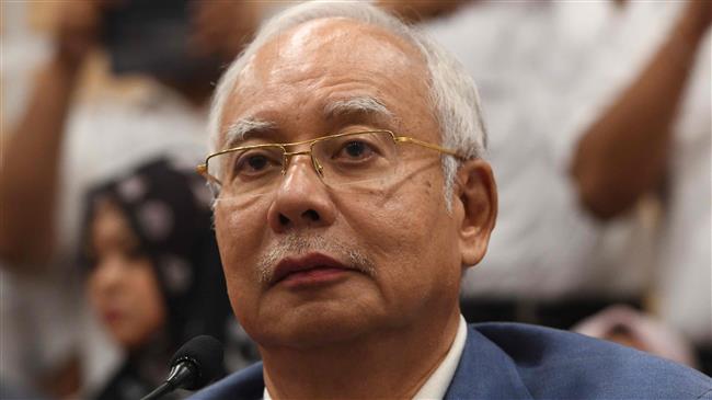 Malaysia police raid complex linked to ex-PM Najib
