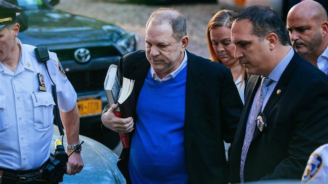 Harvey Weinstein arrested, charged with rape