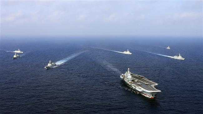 China scrambles jets, warships to ward off US ships 