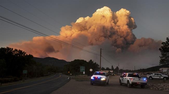 New Mexico wildfires force hundreds to evacuate