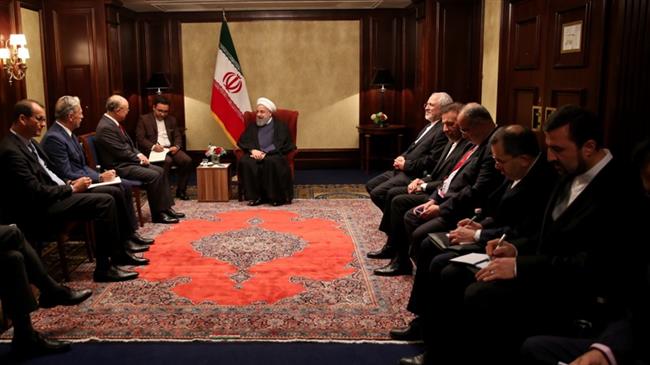 Iran may change cooperation level with IAEA: Rouhani  