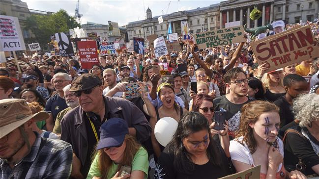 Tens of thousands in London protest Trump’s visit 