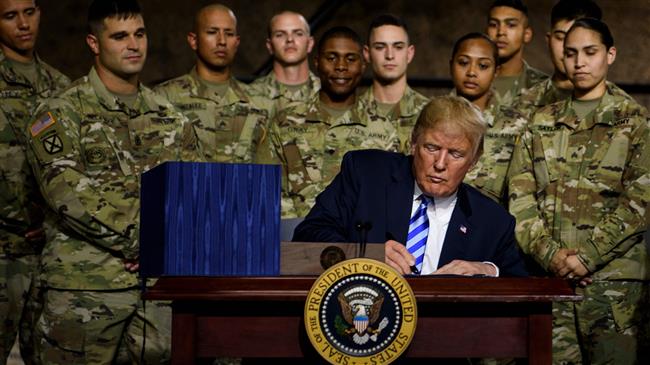Trump signs $717bn US military budget into law