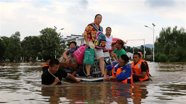China evacuates 127,000 as heavy rains lash Guangdong