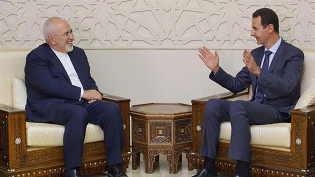 Zarif, Assad say West pressure not to stop terror fight 