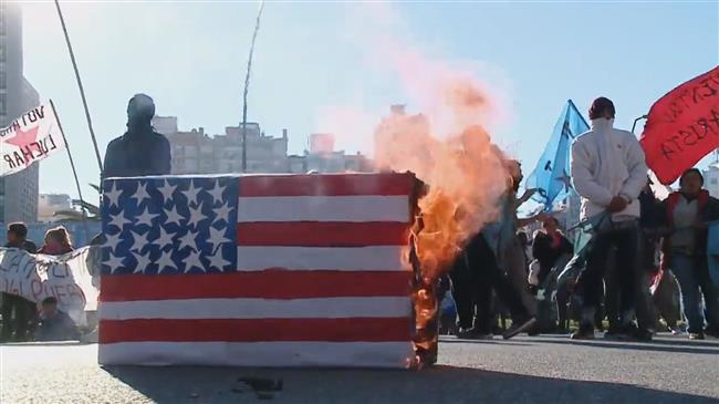 Anti-G20 protesters set US flag on fire in Argentina