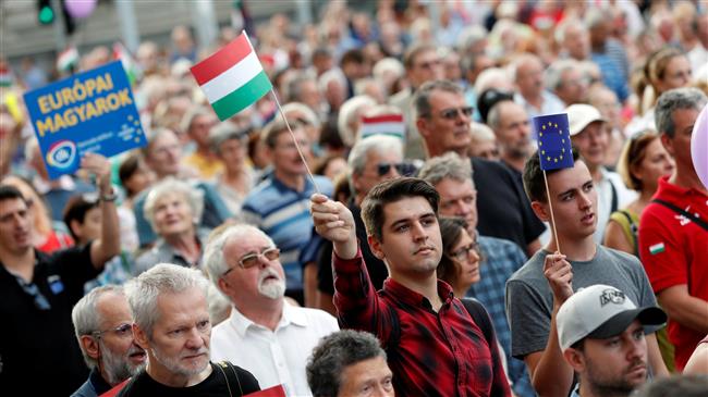 Hungarians protest against PM Orban at pro-EU rally 