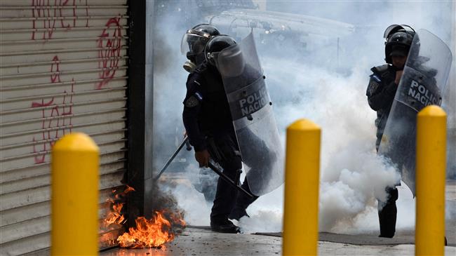Protesters, police face off on Independence Day in Honduras