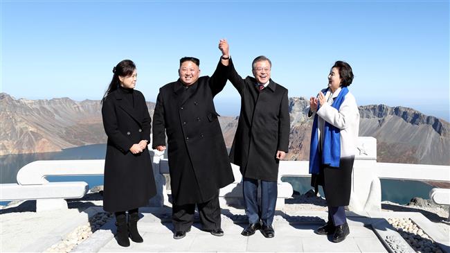 Summit after summit: Korea leaders climb mount together