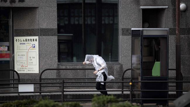 Powerful typhoon pounds Japan, dozens injured 