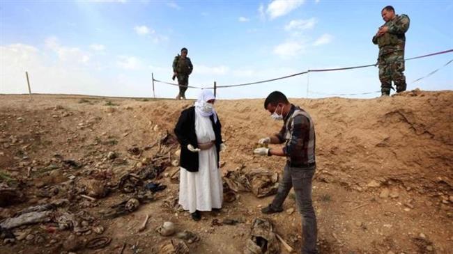 Iraqi security forces discover mass grave near Tikrit