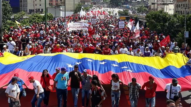 Thousands rally to support Maduro amid US threats 