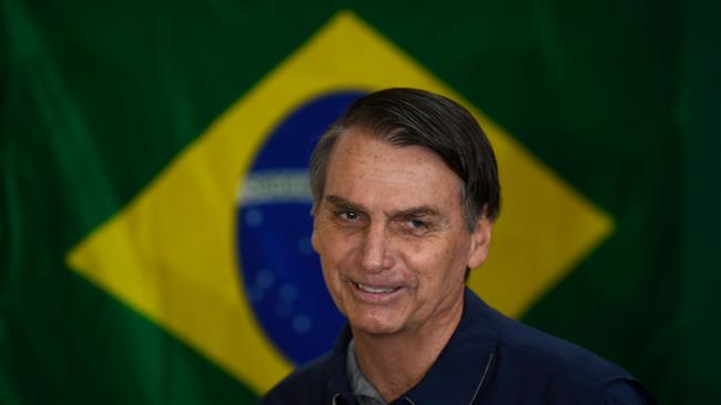 Brazil votes for new president, Bolsonaro in lead 