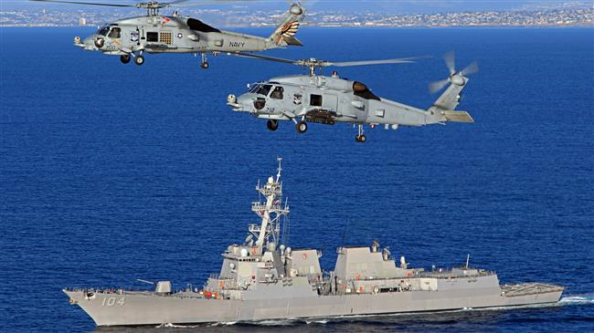 US navy copter crashes on warship, injures 12