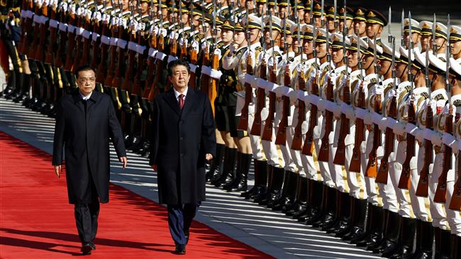 China boosts ties with Japan amid US trade dispute