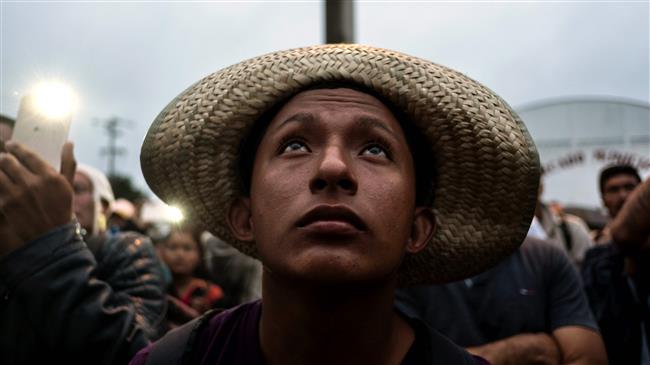 Migrant caravan struggles ahead in Mexico toward US