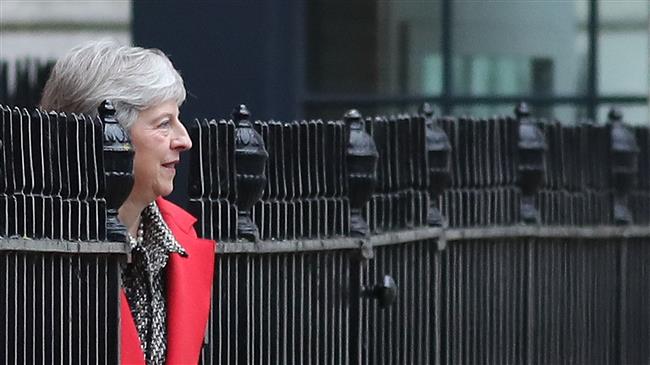 UK PM vows to focus on Brexit talks despite challenges