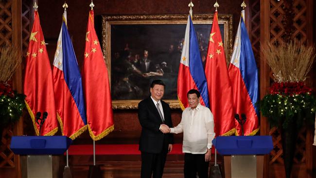 China president arrives in Philippines in attempt to cozy up to US ally