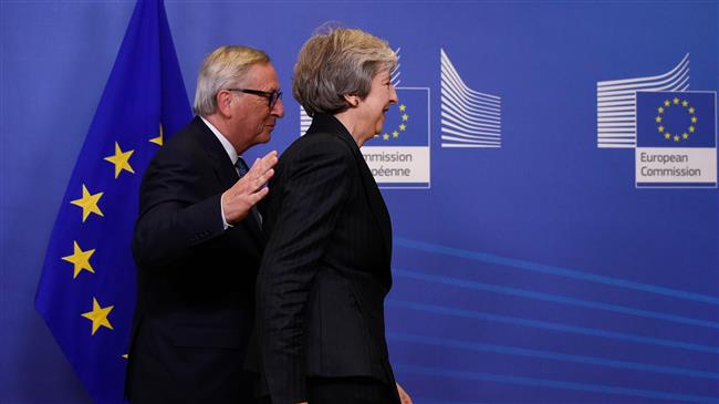 May heads to Brussels as Spain threatens Brexit summit