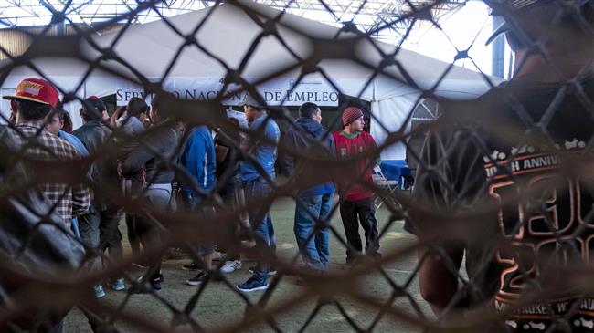 Appeals court upholds block on Trump's asylum ban