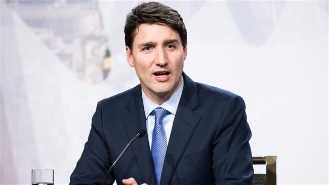 Canada's Trudeau stresses composure amid China arrests