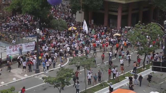 Brazilians protesting pension reforms clash with police
