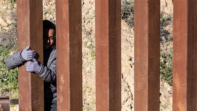 Trump refuses to budge over border wall demand