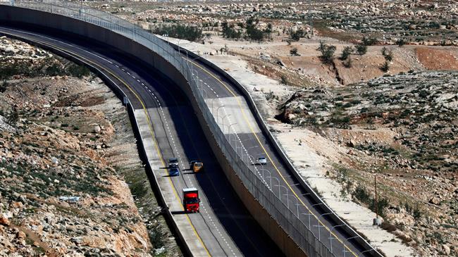 After apartheid wall, Israel unveils ‘apartheid road’