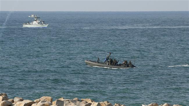 Israeli navy fires at Gaza fishermen, sets boat on fire