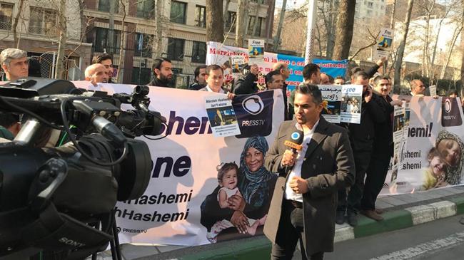 IRIB staff protest Press TV anchor’s detention by US
