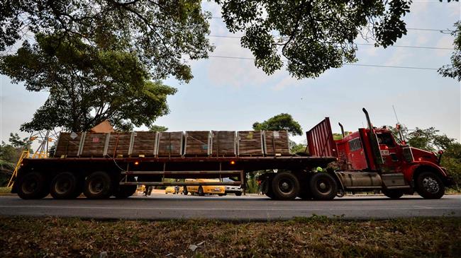 US aid for Venezuela touches down at Colombia border