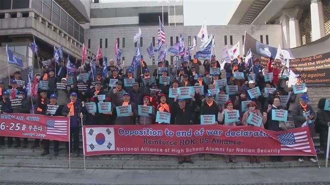 South Koreans rally for and against U.S.-DPRK summit