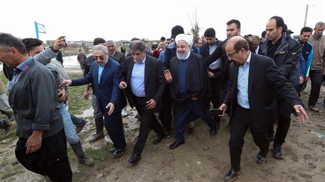 Rouhani vows compensation as he visits flood-hit north