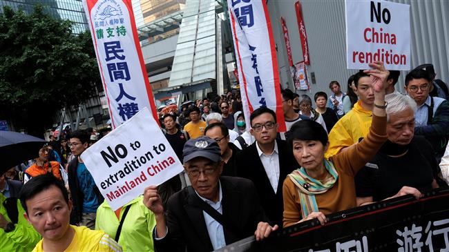 Hong Kong people protest extradition law changes