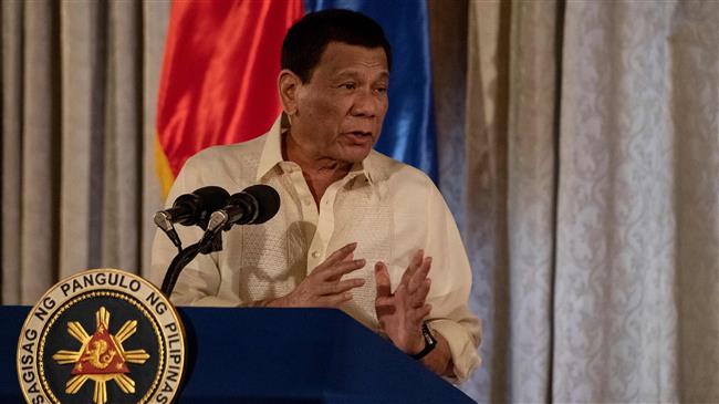 Duterte threatens China with 'suicide mission' over island 