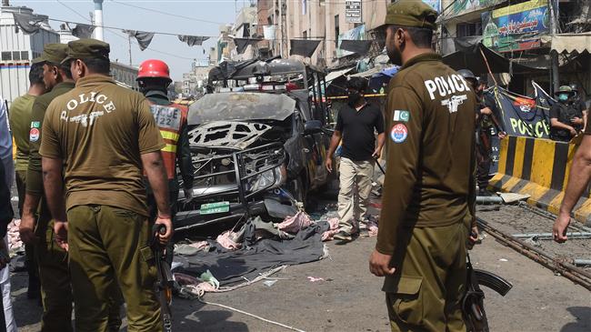 Blast targeting police checkpoint kills 9 in Pakistan