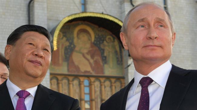 Russia, China pledge to boost alliance