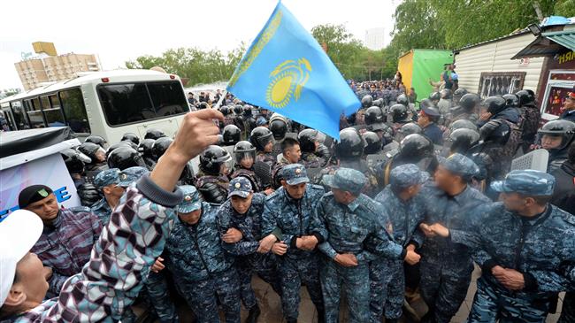 Police ‘arrest hundreds’ as Kazakhs elect new president