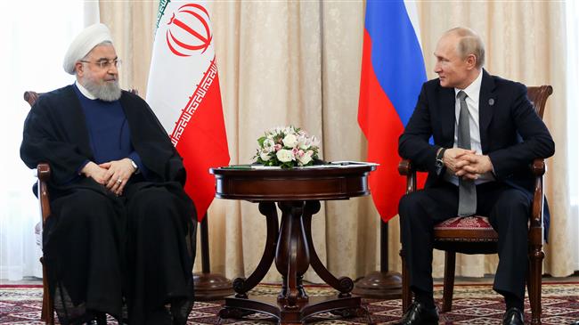 Rouhani, Putin discuss energy investment in Iran