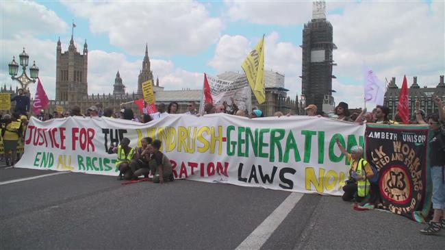 Protesters block London’s Westminister bridge for Windrush Day