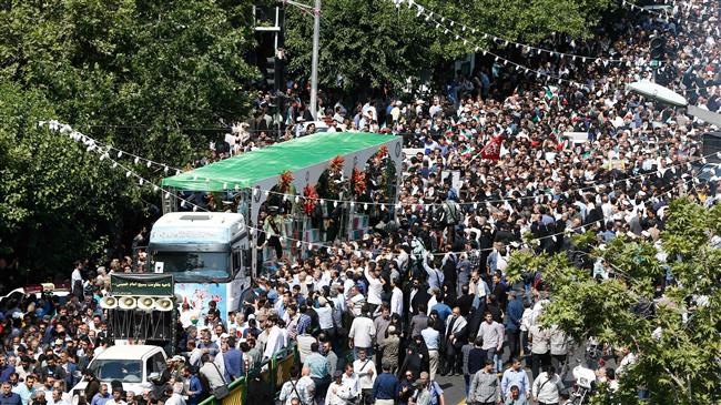 Iran bids farewell to 150 martyrs of 1980s war