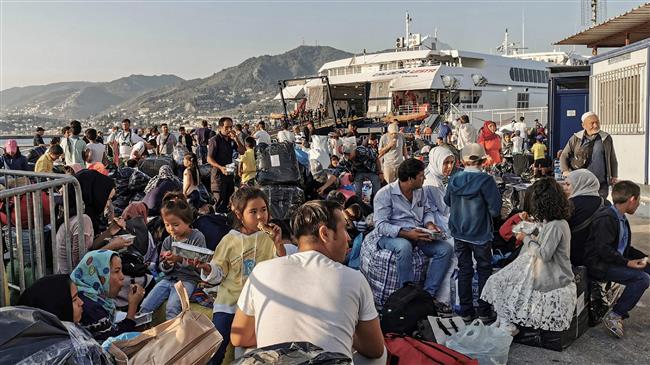 Hundreds of refugees moved from ‘hell’ of Greek island