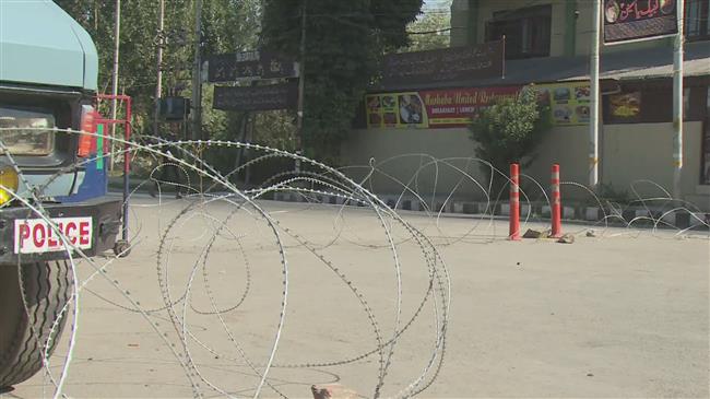 Kashmiris mark Ashura amid tough curfew