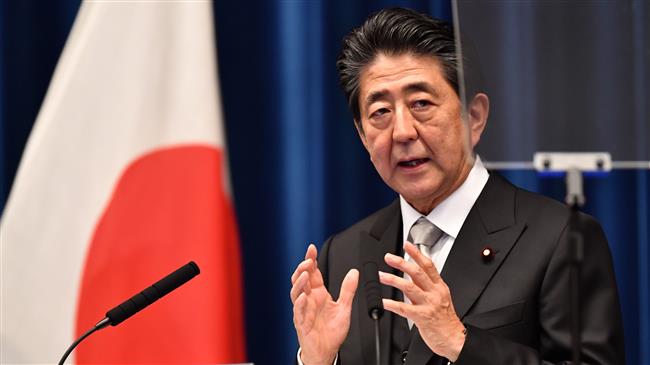 Japan's Shinzo Abe rejiggers cabinet